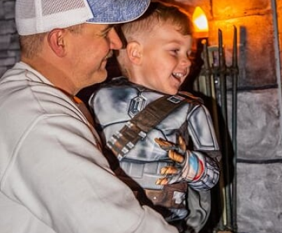 Dad and son admire werewolf mirror 1